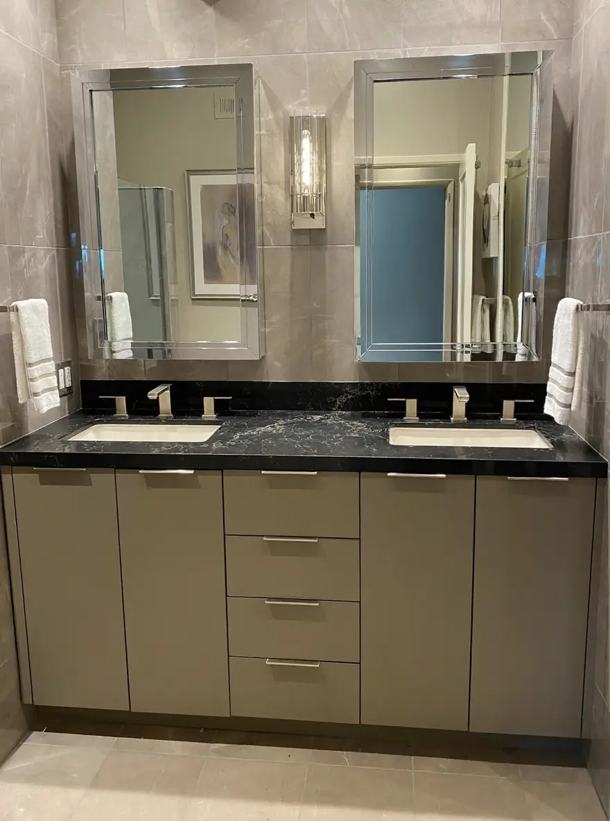 Black marble double vanity with chrome fixtures